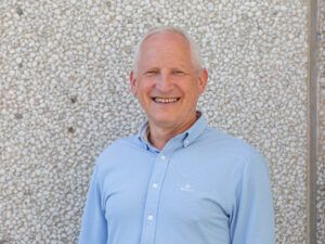Freddy Munk Larsen, Managing Director at ProAssign ApS, wearing a blue shirt.