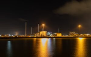 Esbjerg Harbor at night, lights reflecting on the water – a significant location for ProAssign.